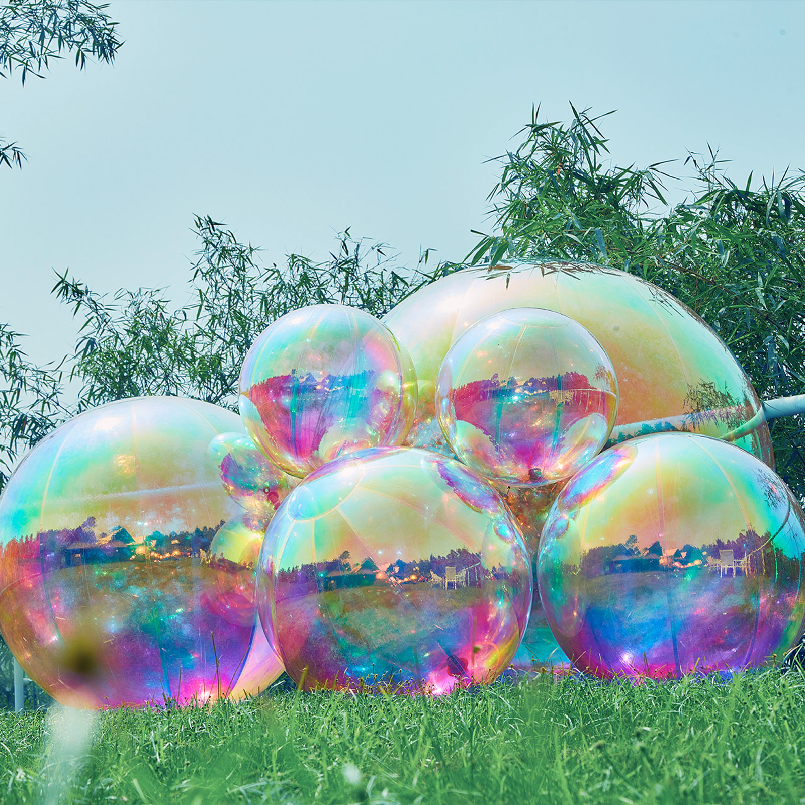 In art exhibitions, colorful inflatable mirror balls and big shiny balls can also become unique art installations Inflatable Mirror Ball Combination Set - 6 Colourful Balls - Image 3