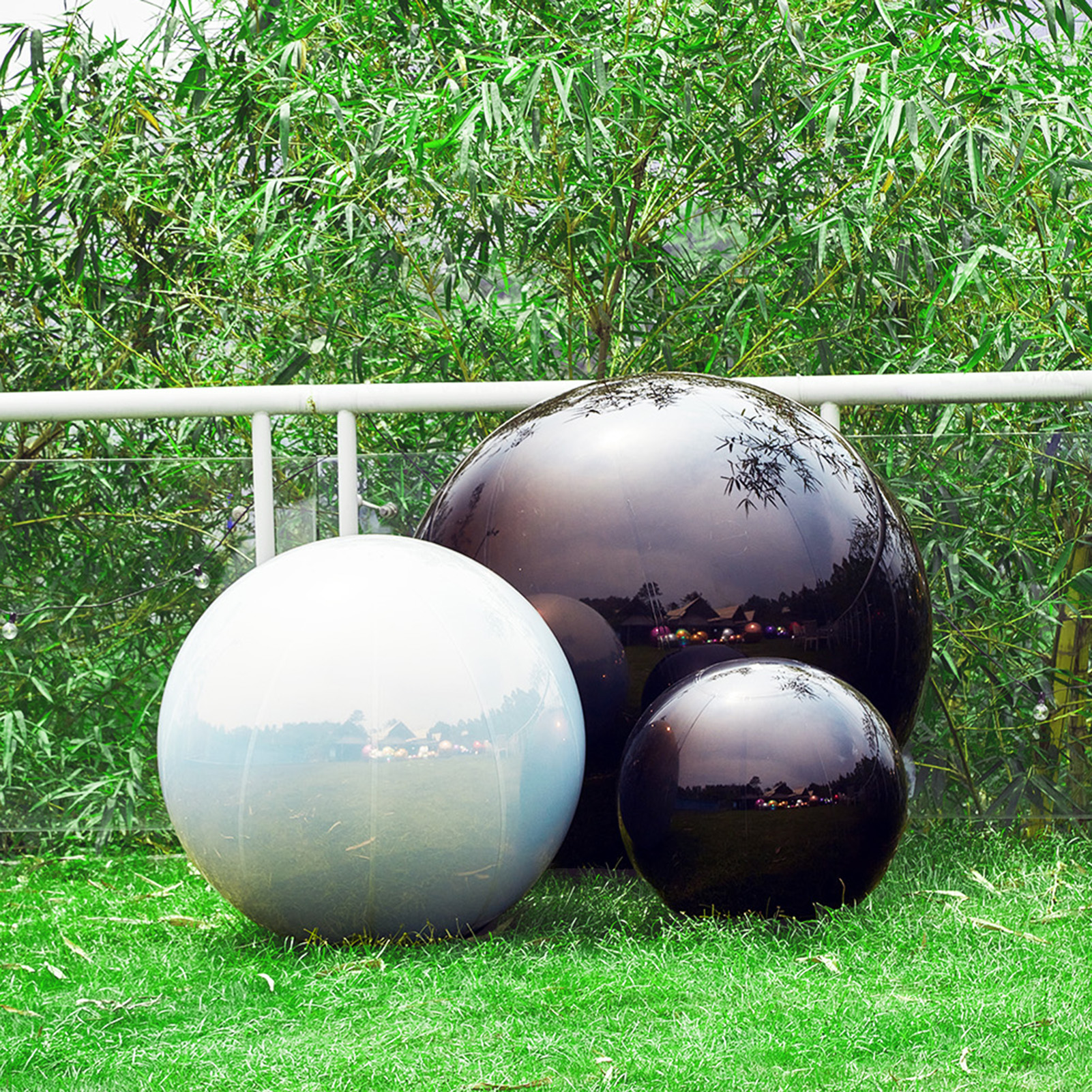 The combination of black and milky white inflatable mirrore balls is simple and elegant, adding a dazzling brilliance to the event Inflatable Mirror Ball Combination Set – 3-ball BW combos - 图片 2