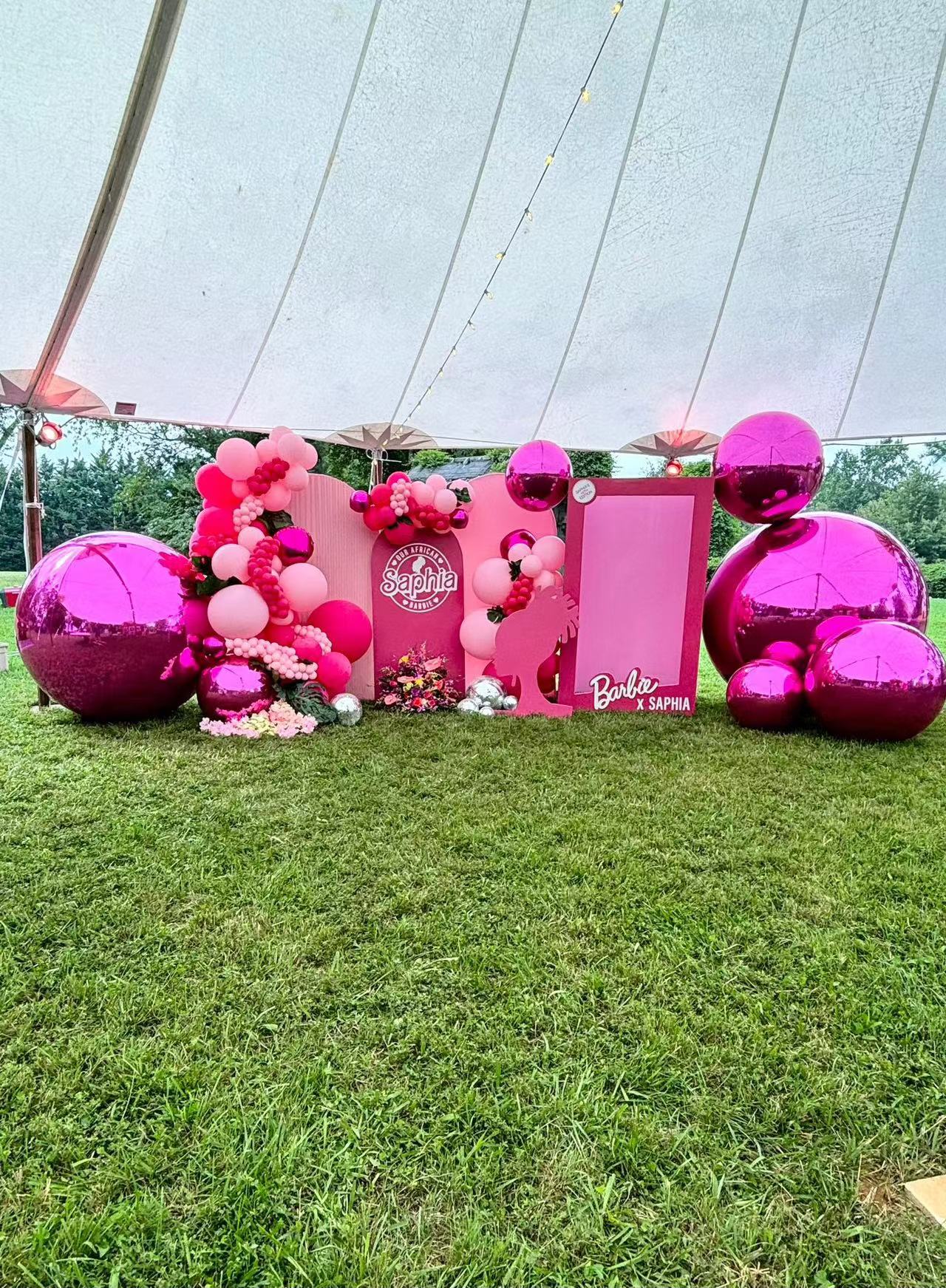 Inflatable mirror balls are used for wedding scene decoration.