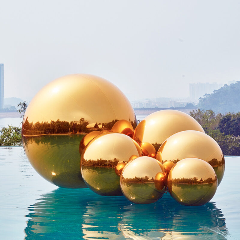 Golden inflatable mirror ball.